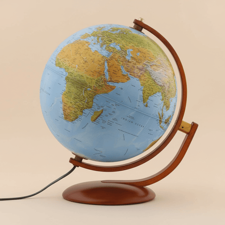 Full studio profile shot of the Gibraltar globe highlighting accurate proportions and wood construction.